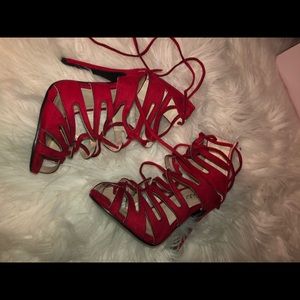 Lace up red velvet heels